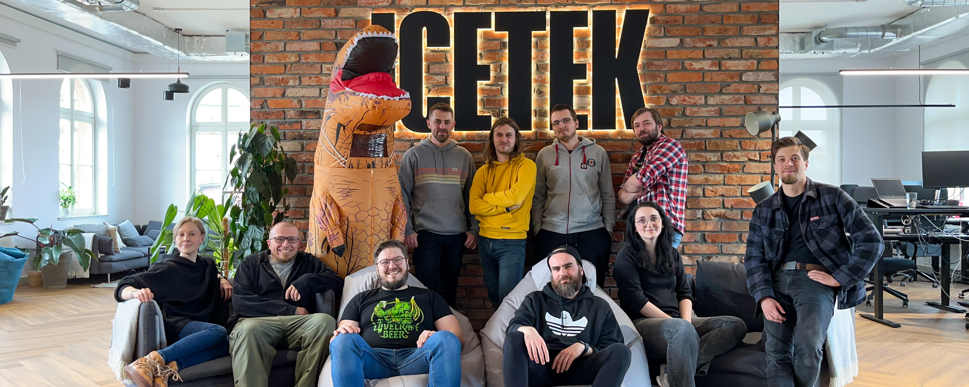 picture in the office of Icetek Team with Icetek logo in the background.
